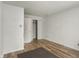 A well-lit bedroom features hardwood floors, neutral paint, and ample storage at 12404 Rose Haven Dr, Indianapolis, IN 46235