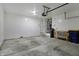 Spacious two-car garage with ample room for storage and includes utility equipment at 12404 Rose Haven Dr, Indianapolis, IN 46235