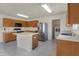 Spacious kitchen with ample cabinet space and stainless steel appliances, including island at 12404 Rose Haven Dr, Indianapolis, IN 46235