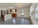 Bright kitchen with stainless steel appliances, island, and access to the backyard at 12404 Rose Haven Dr, Indianapolis, IN 46235