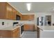 Bright kitchen with stainless steel appliances, island, and modern finishes at 12404 Rose Haven Dr, Indianapolis, IN 46235