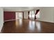 Spacious living room with hardwood floors, natural light, and open layout for entertaining at 12404 Rose Haven Dr, Indianapolis, IN 46235