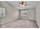 Inviting bedroom with plush carpeting and a bright window with natural light at 12570 Timber Creek Dr # 7, Carmel, IN 46032