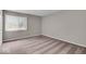 Bright, carpeted bedroom with a large window at 12570 Timber Creek Dr # 7, Carmel, IN 46032