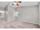 Comfortable bedroom with neutral colors, carpet, and ensuite bathroom access at 12570 Timber Creek Dr # 7, Carmel, IN 46032