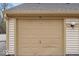 Attached garage with an insulated door for energy efficiency and convenience at 12570 Timber Creek Dr # 7, Carmel, IN 46032