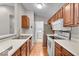 Well-lit kitchen with generous counter space and modern appliances at 12570 Timber Creek Dr # 7, Carmel, IN 46032