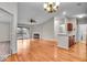 Inviting living area with wood floors, fireplace, and open floorplan at 12570 Timber Creek Dr # 7, Carmel, IN 46032