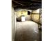 Basement featuring unfinished walls and a washing machine at 1302 Lindley Ave, Indianapolis, IN 46241