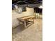 Basement view showcasing a table, unfinished walls, and exposed ductwork at 1302 Lindley Ave, Indianapolis, IN 46241