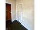 Bedroom with natural light and hardwood floors with built-in storage at 1302 Lindley Ave, Indianapolis, IN 46241
