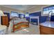 Stylish bedroom with bright blue accent wall, white fireplace, and cheerful decor at 1325 Fordice Rd, Lebanon, IN 46052