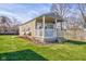 Charming cottage-style home with a cozy front porch and well-maintained lawn at 1325 Fordice Rd, Lebanon, IN 46052