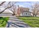 Traditional home featuring a long driveway and well-maintained landscaping, plus detached three car garage at 1325 Fordice Rd, Lebanon, IN 46052