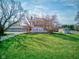 Charming home with a large front lawn and a detached three car garage, plus additional outbuilding at 1325 Fordice Rd, Lebanon, IN 46052