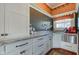Cozy kitchen space featuring white cabinets, granite countertops, and modern appliances at 1325 Fordice Rd, Lebanon, IN 46052