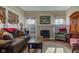 Cozy living room featuring a fireplace and natural light at 1325 Fordice Rd, Lebanon, IN 46052