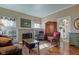 Inviting living room with hardwood floors, fireplace, and bright natural light at 1325 Fordice Rd, Lebanon, IN 46052