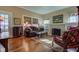 Comfortable living room with a brick fireplace and hardwood floors at 1325 Fordice Rd, Lebanon, IN 46052