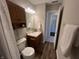 Bathroom shows a wooden vanity and decorative accents at 1404 Alonzo Pl, Indianapolis, IN 46217