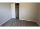 Bedroom with plush carpet and bi-fold closet door at 1404 Alonzo Pl, Indianapolis, IN 46217