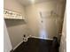 Practical laundry space with storage and essential hookups at 1404 Alonzo Pl, Indianapolis, IN 46217