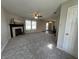 Spacious living room featuring plush carpeting and a fireplace at 1404 Alonzo Pl, Indianapolis, IN 46217