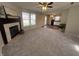 Inviting living room with a fireplace and an open layout that connects to the kitchen at 1404 Alonzo Pl, Indianapolis, IN 46217