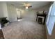 Living room with fireplace, neutral walls, and carpet flooring at 1404 Alonzo Pl, Indianapolis, IN 46217