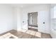 Bright entryway featuring double doors and hardwood floors leading to the home's interior at 14532 Hanford Ln, Carmel, IN 46074