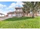 Charming brick and siding two-story home with a two-car garage and a spacious front yard at 1598 Thornburg Ln, Franklin, IN 46131