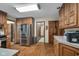 Well-equipped kitchen featuring stainless steel appliances, ample cabinet space, and hardwood floors at 1598 Thornburg Ln, Franklin, IN 46131