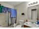 Standard bathroom with a shower-tub combination, a white toilet, and sink with a wood vanity at 16838 Aulton Dr, Noblesville, IN 46060
