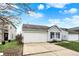 Delightful single-Gathering home with a white garage door, blue shutters, and well-maintained yard at 16838 Aulton Dr, Noblesville, IN 46060