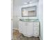 Bathroom vanity with drawers and gold water fixtures at 1791 S Conservation Club Rd, Morgantown, IN 46160