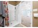 Bathroom featuring full walk-in shower with tile flooring and neutral paint at 1791 S Conservation Club Rd, Morgantown, IN 46160