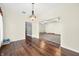 Dining room with hardwood floors and a decorative chandelier at 1791 S Conservation Club Rd, Morgantown, IN 46160
