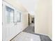 Entryway featuring double front doors and tile flooring that flows into the hallway at 1791 S Conservation Club Rd, Morgantown, IN 46160