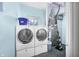 Laundry room with a washer, dryer, and other cleaning supplies at 1791 S Conservation Club Rd, Morgantown, IN 46160