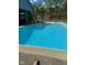 Inviting outdoor pool with crystal-clear water, perfect for recreation and relaxation on sunny days at 1791 S Conservation Club Rd, Morgantown, IN 46160