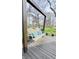 Relaxing backyard porch swing and lush greenery for outdoor enjoyment at 1813 Birch Dr, Plainfield, IN 46168