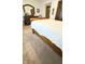 Bedroom displaying carpeted floors, wooden dresser, and a white bed at 1813 Birch Dr, Plainfield, IN 46168