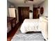Sunlit bedroom with a crib, soft area rug, and large closet with ample storage space at 1813 Birch Dr, Plainfield, IN 46168