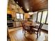 Bright kitchen with wood cabinets, stainless steel appliances, and a cozy dining area at 1813 Birch Dr, Plainfield, IN 46168