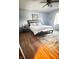 Main bedroom with beautiful light blue walls, plush rug, and natural light at 1813 Birch Dr, Plainfield, IN 46168