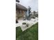 Charming patio with outdoor seating and a cute puppy, creating a perfect space for entertaining at 1813 Birch Dr, Plainfield, IN 46168