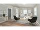 Bright living room with stylish seating, modern decor, a neutral palette, and a cozy rug for a welcoming atmosphere at 1946 N Riley Ave, Indianapolis, IN 46218