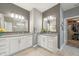 Bathroom with dual sinks, a vanity, and modern fixtures at 1972 Mobley Dr, Westfield, IN 46074