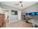 Bright room featuring multiple monitors, and a door that leads into the adjoining room at 1972 Mobley Dr, Westfield, IN 46074