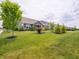 A serene neighborhood street lined with well-maintained homes and verdant lawns at 1972 Mobley Dr, Westfield, IN 46074